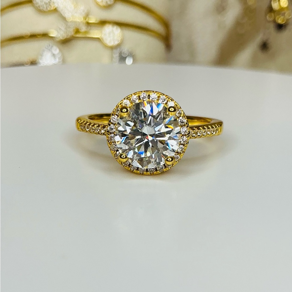 Gold Halo Solitaire Ring with a moissanite clear center stone. 💎💎